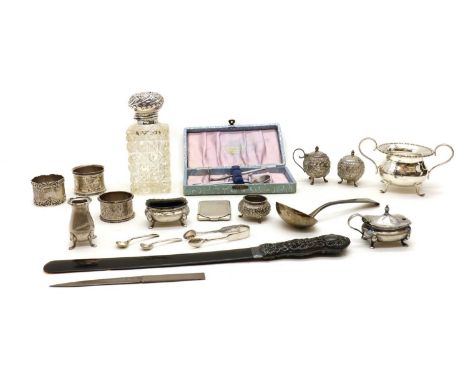 A collection of silver items,to include a George IV ladle, by William Chawner II, London 1824 tortoiseshell page-turner, 32.5