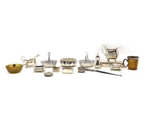 A collection of silver items,to include a George III cream, London 1813, 11cm high, a cream jug, Birmingham 1905, on three ho