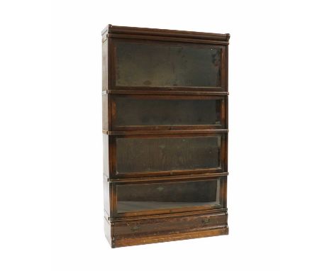 A Globe Wernicke modular bookcase,early 20th century, with four sections, raised on a single drawer base, 87cm wide31cm deep1