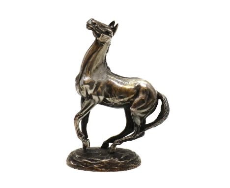 Lorne McKean (b.1939),'Playing Up', a silver model of a horse, by John Pinches, London 1976, signed, in a fitted box,12cm hig