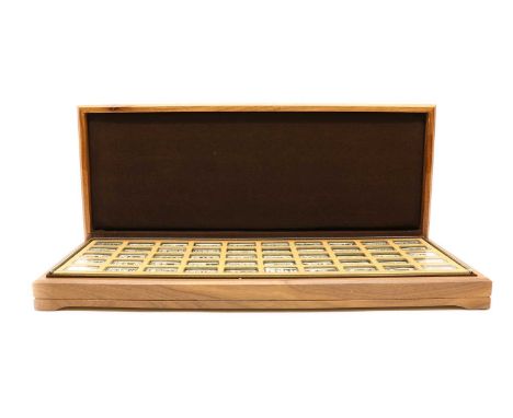 A limited edition '1000 Years of British Monarchy' cased set of silver ingots,numbered 1952, complete with paperwork, compris