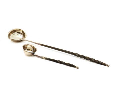 A silver toddy ladle,18th century, unmarked, with a twisted baleen handle, 37cm longand another example,marks rubbed,19cm lon