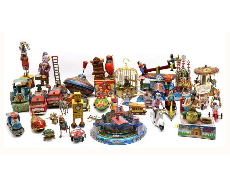 A large collection of tin plate toys,to include various wind-up examples, including fire engines, trains fairground rides, an