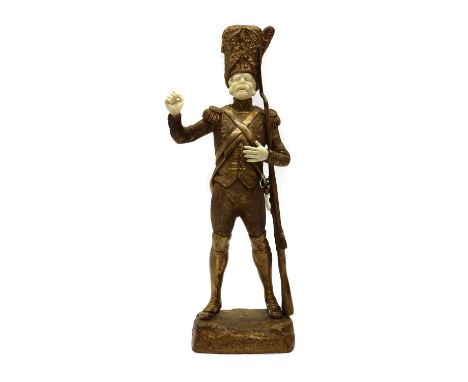 Georges Ormeth (French, 1895-1925),'Le joyeux grenadier' (The Merry Grenadier), gilt bronze with ivory details, signed to the