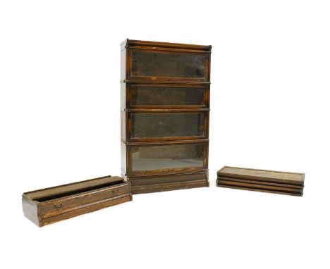 A Globe Wernicke modular bookcase,early 20th century, with four sections,87cm wide31cm deep146cm high,together with two addit