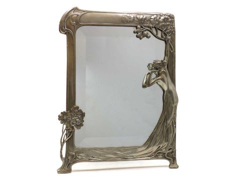A WMF style pewter easel back mirror,early 20th century, modelled with a lady in a sinuous dress enclosing the bevelled plate
