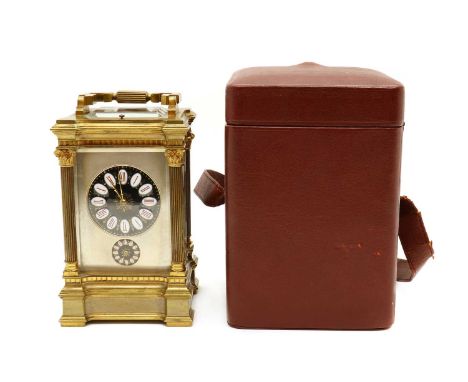 A brass Grand Sonnerie carriage clock,early 20th century, French, the bevelled glass case with an enamelled dial and subsidia