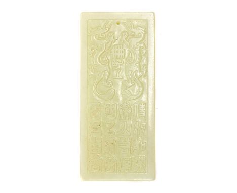 A Chinese jade plaque,20th century, carved with characters, pierced with a hole,10cm longCondition ReportNo obvious faults.