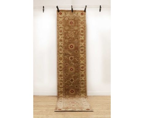 A Ziegler runner,of recent manufacture, decorated with foliate motifs to a pale ground,348 x 78cmCondition ReportSome marks a