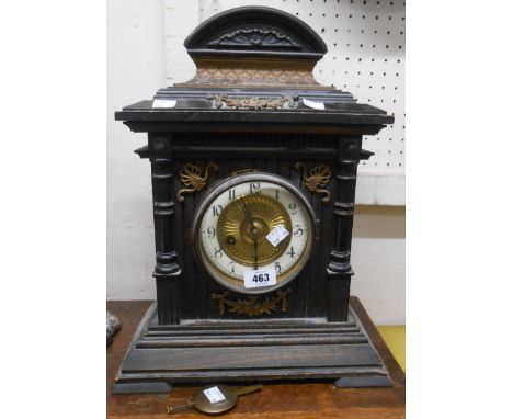 A late 19th Century German stained wood cased mantle clock with scale effect pediment and HAC eight day gong striking movemen