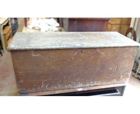 A 1.2m 19th Century wood grain painted pine lift-top transit trunk with internal candle box and flanking rope lug handles
