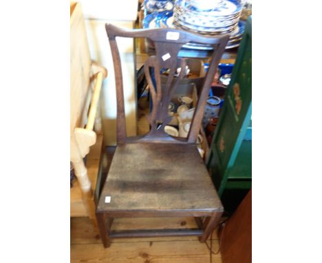 A Georgian mahogany framed Chippendale style standard chair with solid seat panel, set on cut-down legs