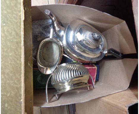 A box containing a quantity of silver plated items including three piece tea set and boxed cutlery, etc.