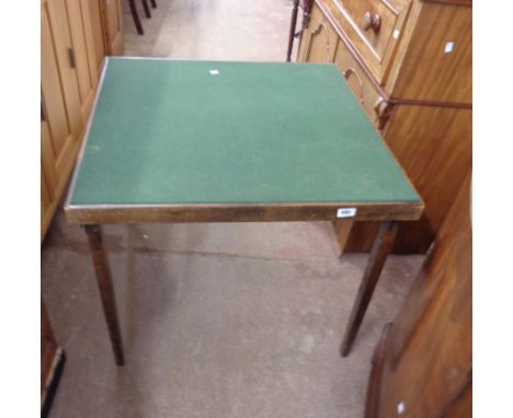 A vintage stained wood framed card table with baise inset top and folding legs
