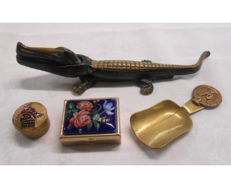 A vintage brass novelty crocodile form nutcracker - sold with a small assortment of brass, etc.