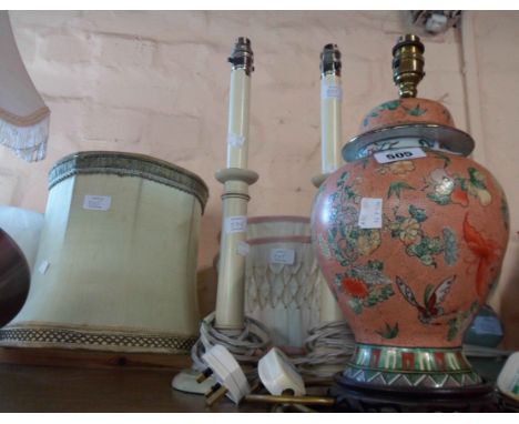 A 20th Century Chinese porcelain lamp of temple jar form with carved hardwood base - a/f - sold with a pair of 20th Century t