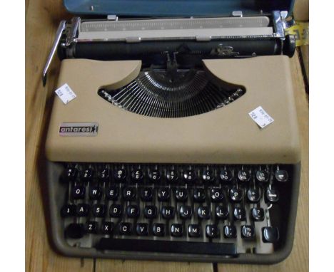 A vintage Antares portable typewriter in original case