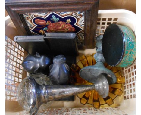 A box containing assorted collectable items including carved ebony elephant bookends, Victorian tile teapot stand, etc.