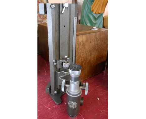 A vintage wooden cased Baker &amp; Co. engineer's travelling microscope