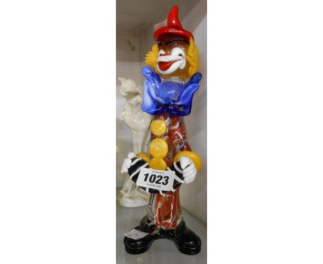 A vintage Murano accordion playing glass clown