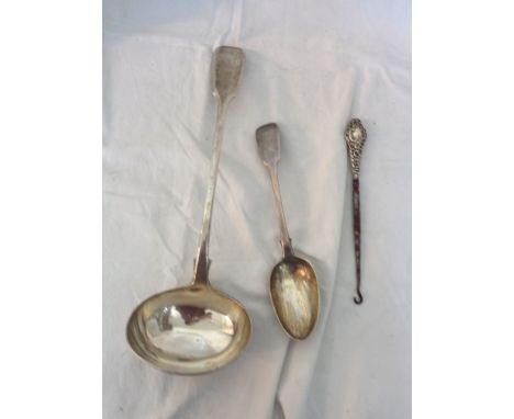 A large silver fiddle pattern ladle - London 1840 - sold with a tablespoon and silver handled button hook