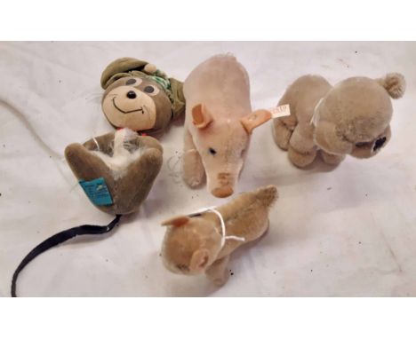 Four small vintage stuffed toys including Steiff, Millenium Pig, etc.