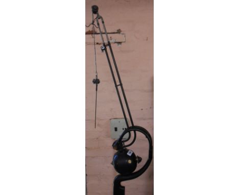 A vintage dentist's drill assembly with cast iron base - later conversion to lamp