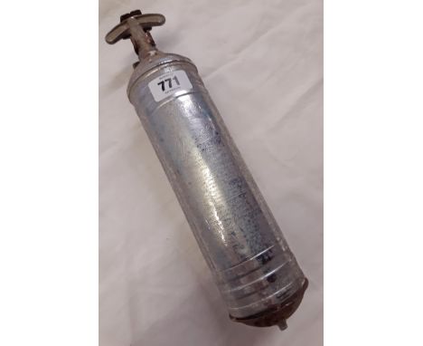 A vintage Pyrene fire extinguisher with chrome plated body on original tin bracket