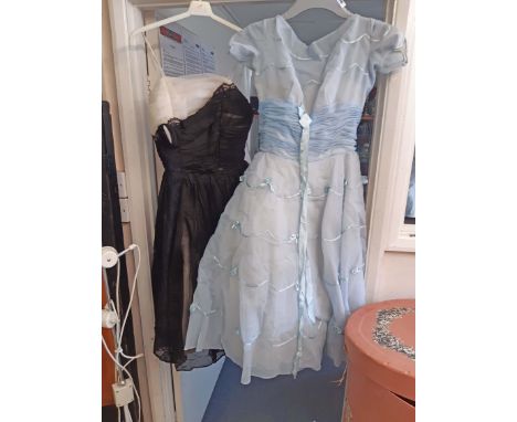 A vintage black and white organza cocktail dress with ruched bodice and gathered skirt with lace trim - sold with a light blu