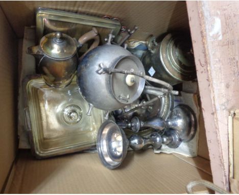 A quantity of silver plated items including a spherical spirit tea kettle, pair of candlesticks, dishes, etc.