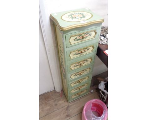 A 30cm wide modern decorative narrow chest with flight of seven drawers, with all round painted roses decoration, set on turn