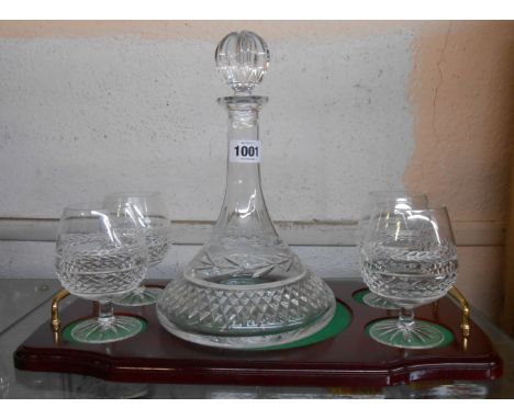 A Galway crystal glass decanter with four brandy balloons on serving tray