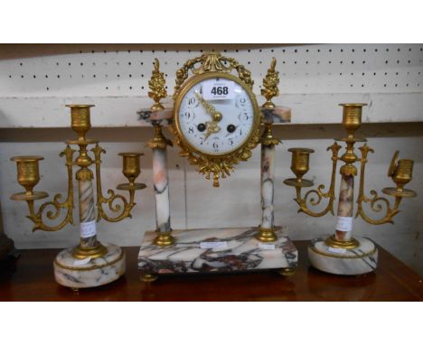 A 19th Century French clock garniture comprising ornate drum and marble pillar clock with eight day bell striking movement an