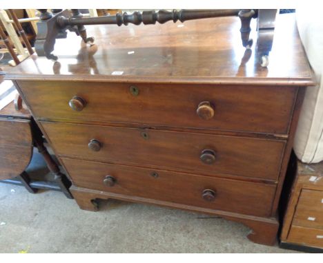 A 1.1m late Georgian mahogany chest of three long graduated drawers, set on bracket feet - splits and other age related wear