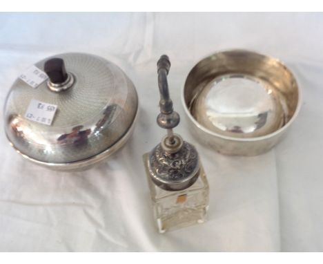 A silver clad powder bowl with engine turned decoration, bakelite lining and personal inscription - sold with a silver dog bo