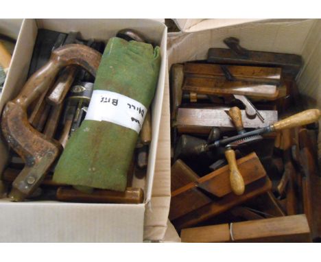 A collection of circa 1920's vintage tools including twenty five shaping planes, carpenter's brace and saw set, etc.