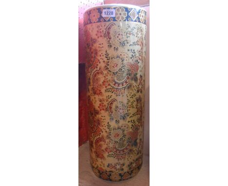 A large modern Chinese ceramic umbrella stand decorated with all over gilt floral pattern