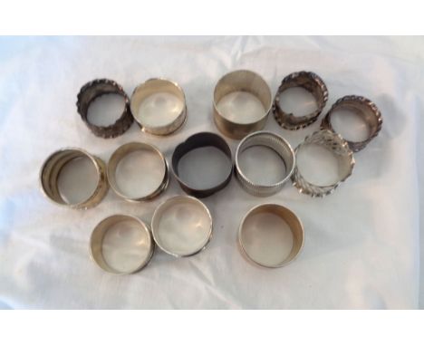 A collection of assorted silver napkin rings - some personalised, various condition