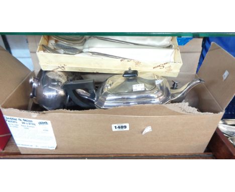 A box containing a quantity of silver plated items including teaware, stag decorated dish, quaish, muffin dish, etc.