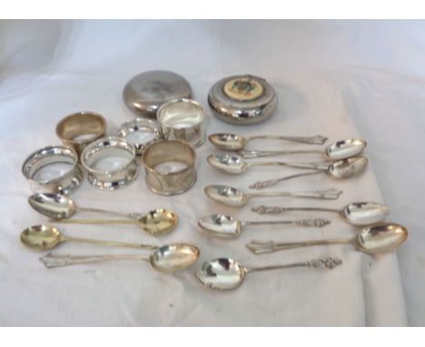 Various small silver spoons and napkin rings, also two plated snuff boxes