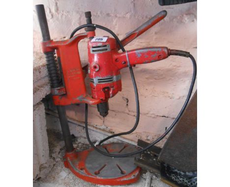 A vintage Black and Decker Model 5 Berth drill and stand