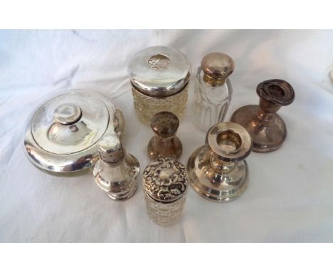 Various silver topped dressing table glass jars, two damaged candlesticks and two pepperettes - various condition