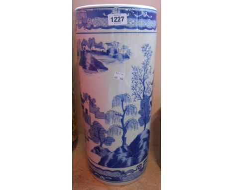 A modern Chinese blue and white ceramic umbrella stand