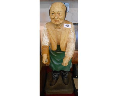 A vintage fibreglass dumb waiter display figure - tray missing