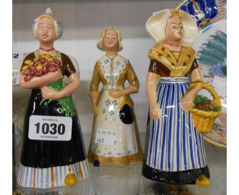 Three Zenith Dutch ceramic Bols novelty spirit flasks, each depicting a different local traditional dress