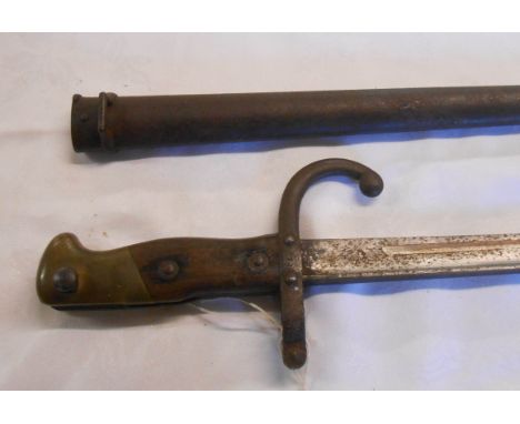 A late 19th Century French 1884 pattern gras bayonet and scabbard