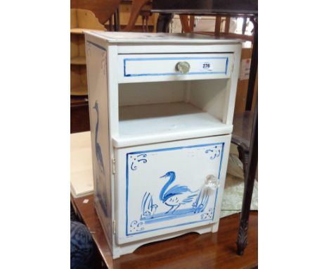 A 37cm painted mixed wood bedside cabinet with heron decoration, drawer, recess and door under