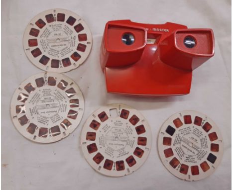 A vintage Viewmaster with Paddington Bear and The Water Babies slides