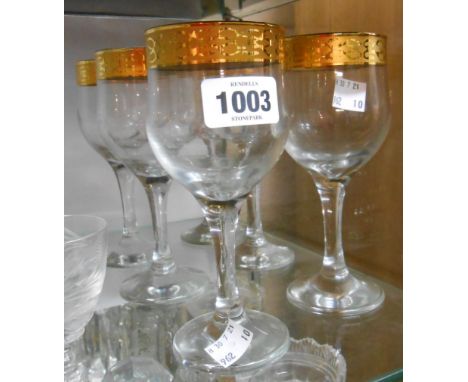 A set of six vintage drinking glasses with gilt decoration