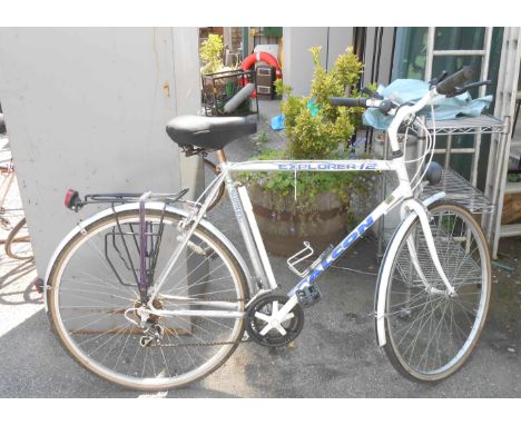 A Falcon Explorer 12 men's bicycle - sold with a basket of accessories, including lights, manual, etc.